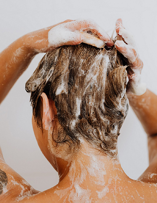 Woman washing hair